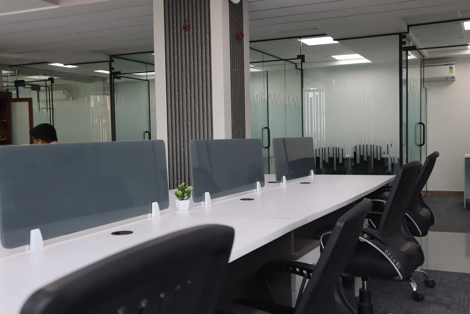 Dedicated desks and glass cabins at UrbanZone Space, SCO 63 · Sector 113