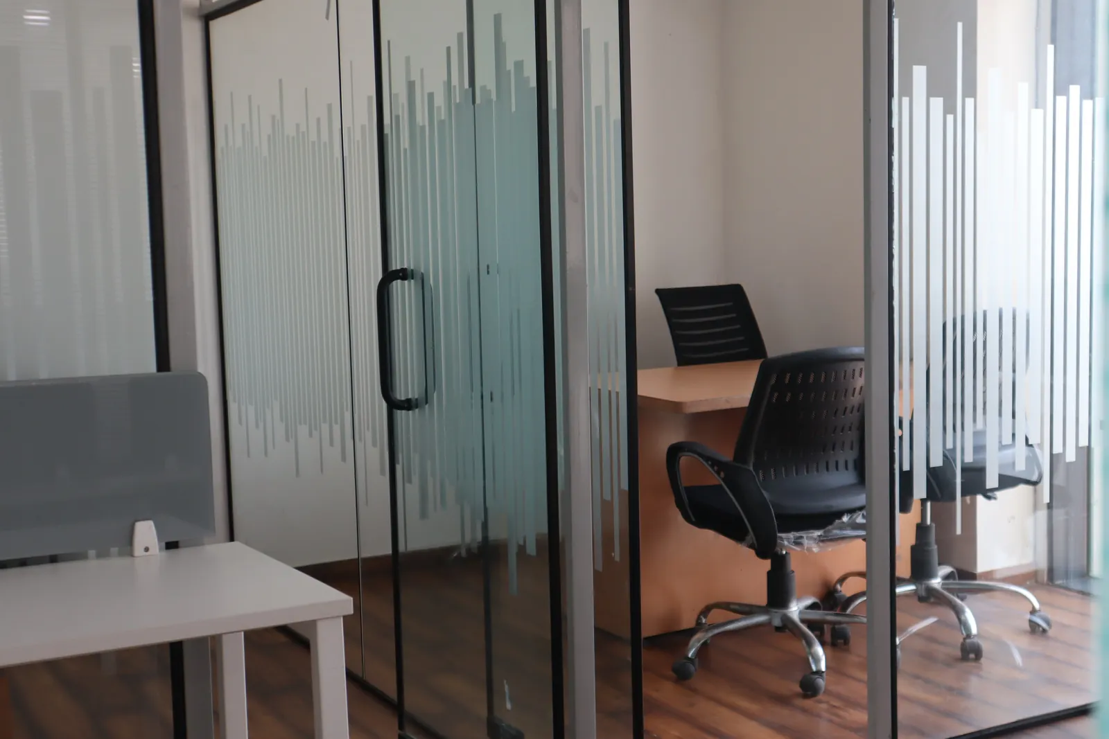 Glass-partitioned cabin at UrbanZone Space, SCO 63 · Sector 113